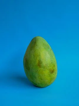 Mango fruit with blue background Stock Photos