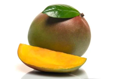 Mango fruit with green leaf and cut mango slice isolated on white background Stock Photos