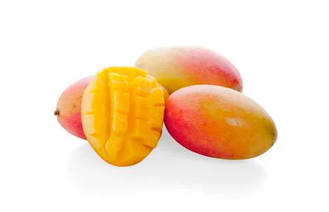 Mango fruit with mango cubes and slices. Isolated on a white background Foto stock