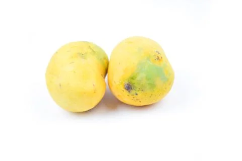 Mango fruit with mango cubes and slices. Isolated on a white background Stock Photos