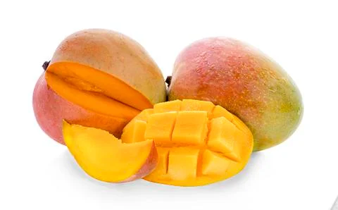 Mango fruit with mango cubes and slices. Stock Photos