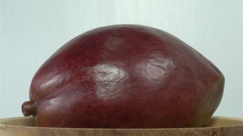 Mango fruit on a plate Stock Footage 152964119