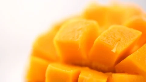 Mango fruit rotating over white background. Ripe juicy tropical mango Stock Footage 113226414