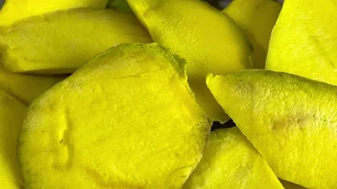 Mango fruit shot in 4k close up. slice of mango served on a plate 스톡 동영상 155573304
