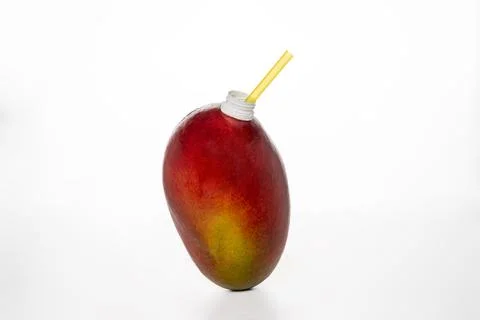 Mango, fruit on a white background, with a straw in the spout to be able to.. Stock Photos