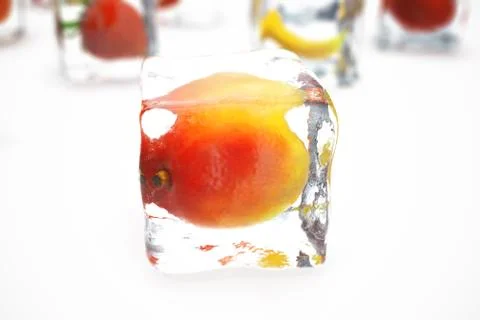Mango in ice cube isolated on white with depth of field effects. Ice cubes with 스톡 일러스트