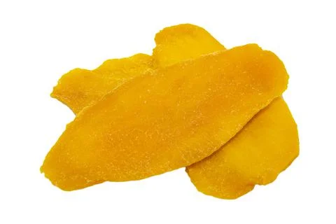 Mango isolate. Pieces of dried mango on a white background close-up Stock Photos