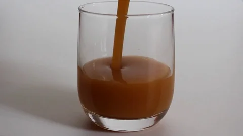 Mango juice in glass Stock-Footage 75934824