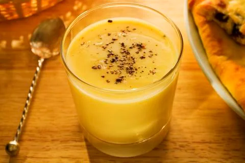 Mango lassi with cardamom Stock Photos