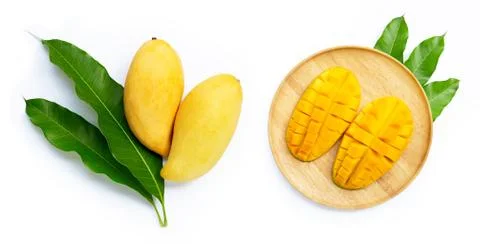 Mango with leaves on white background. Stock Photos
