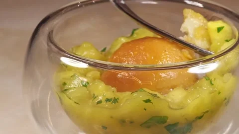 Mango, Passion Fruit And Lime Rum Baba Palate Cleanser At Afternoon Tea, UK Stock Footage 296038716