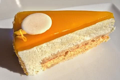 Mango passion fruit cream cake with yellow fruit Stock Photos