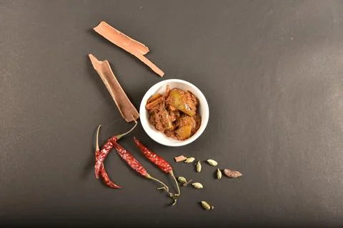 Mango pickle garnish with spices.A mango pickle is a variety of pickle prepar Stock Photos
