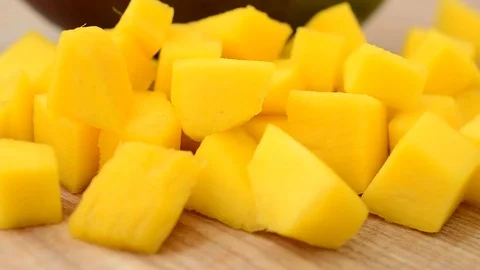 Mango pieces on a wooden board. Stock Footage 75246734