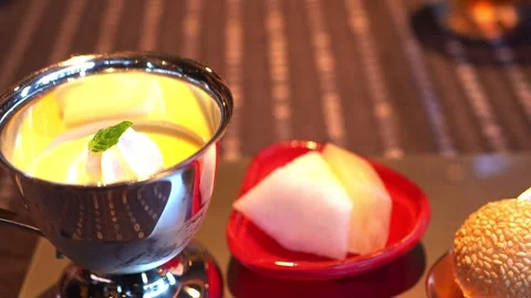 Mango pudding in a silver cup Stock Footage 262265185