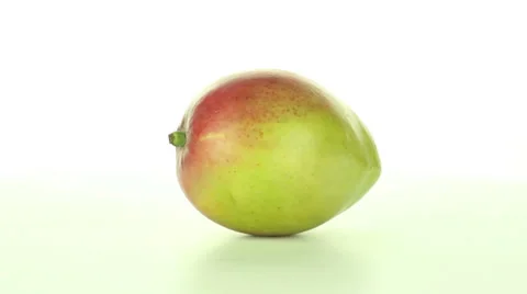 Mango rotates on a white background Stock Footage 37350331