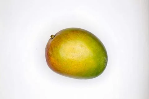 A mango set against a white background 库存照片