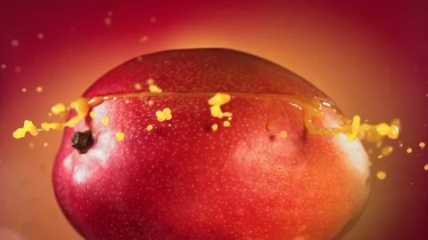 Mango Slice falling and splashing on yellow pink background. Food levitation Video stock 193086373