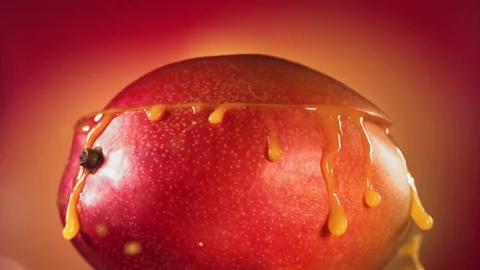 Mango Slice falling and splashing on yellow pink background. Food levitation Video stock 193091294