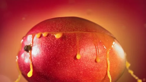 Mango Slice falling and splashing on yellow pink background. Food levitation Video stock 193091748