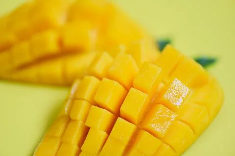 Mango slice tropical summer fruit concept - Close up of sweet ripe mangos c.. Stock Photos