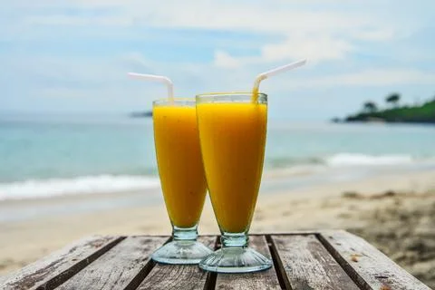Mango smoothies at beach Photos