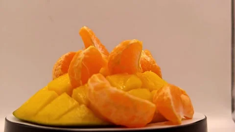 Mango with tangerines Stock Footage 329666090