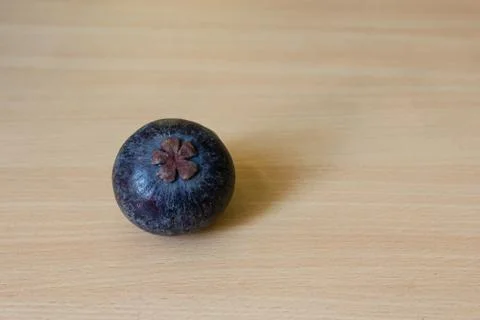 Mangosteen on table Stock Photos