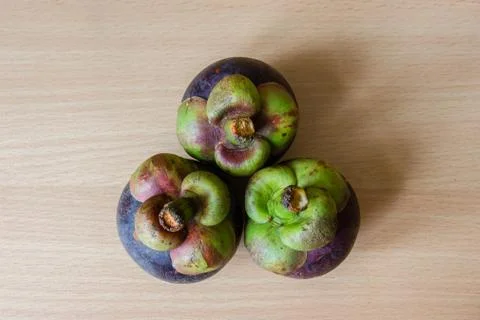 Mangosteen on table Stock Photos