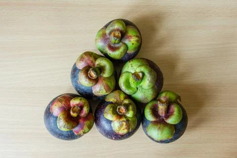 Mangosteen on table Stock Photos