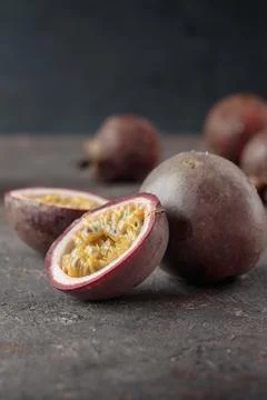 Mangostins on a dark background Stock Photos