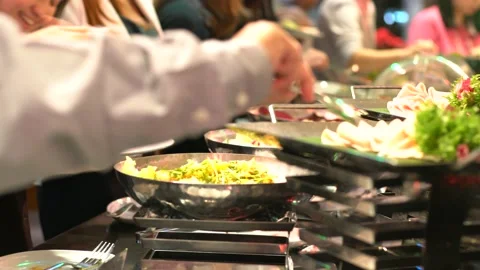 MAnhand grab various meat and vegetable buffet japanese food meal in seminar Stock Footage 149365803