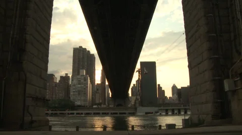 Manhattan and the Hudson seen from below the arches of Brooklyn Bridge Stock Footage 39604980