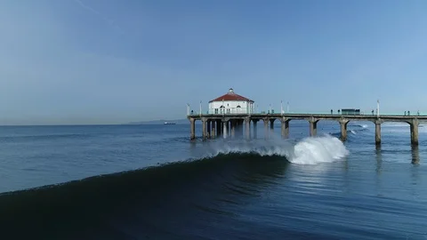 Manhattan Beach Pier, camera moves in and out, wave breaks - * Unedited * Video stock 90093513