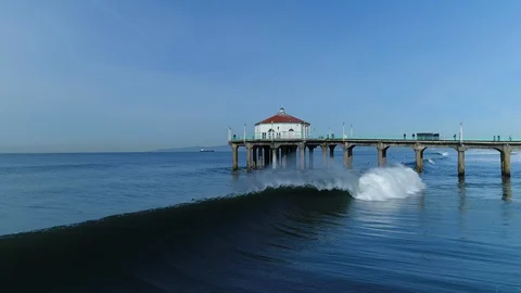 Manhattan Beach Pier, camera moves in and out, wave breaks - * Some Color * Video stock 90093557