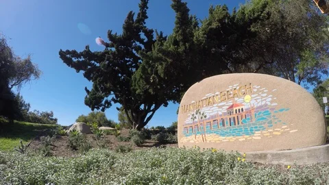 Manhattan Beach Sign in park Stock Footage 102480230