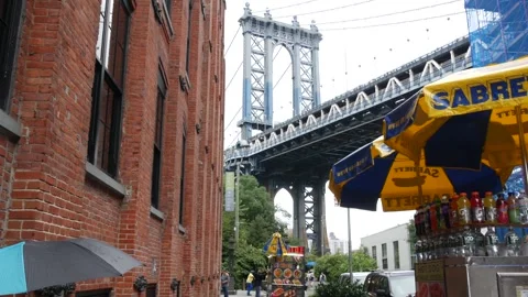 Manhattan bridge in Brooklyn Dumbo. Red brick building on Washington street. New Stock Footage 323680869