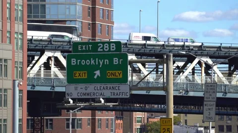 Manhattan bridge overpass and Brooklyn bridge sign - New York cityscape Stock Footage 71069682