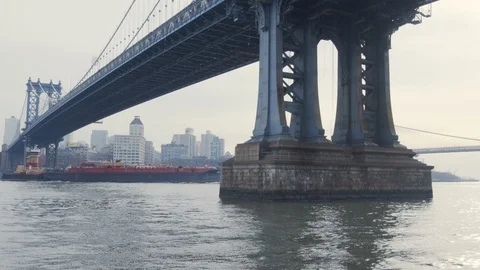Manhattan Bridge With Passing Boats Stock Footage