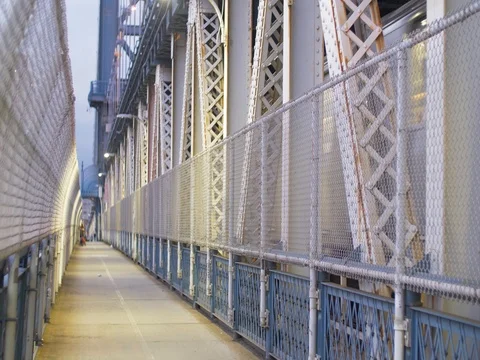 On the Manhattan Bridge while a train passes by Stock-Footage 81690126