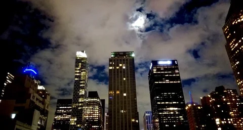 Manhattan Buildings, Moon and Clouds timelapse Stock Footage
