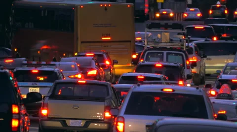 Manhattan congested street traffic jam rush hour cars New York City NYC night Stock Footage 54333699