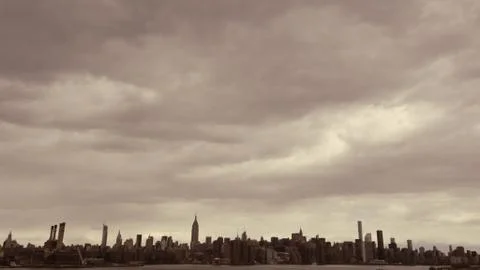 Manhattan landscape under clouds Stock Photos