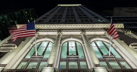 Manhattan, New York City, USA - skyscraper at 5th Ave with US flag - Timelapse Stock Footage