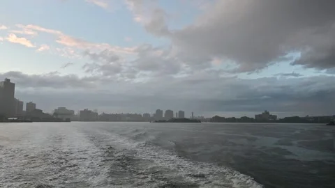 Manhattan at night on the hudson Stock Footage 310657144