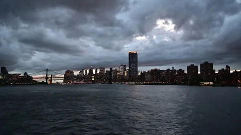 Manhattan at night on the hudson Stock Footage 310657210