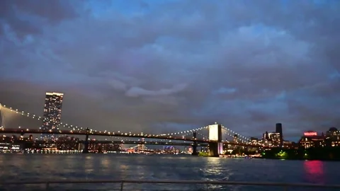 Manhattan at night on the hudson Stock Footage 310657222