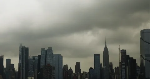 Manhattan NYC Skyline with Dark Clouds in Time-Lapse Video stock 251740522