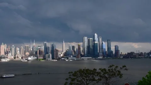 Manhattan skyline dramatic ligh cityscape waterfront Stock Footage 254798039
