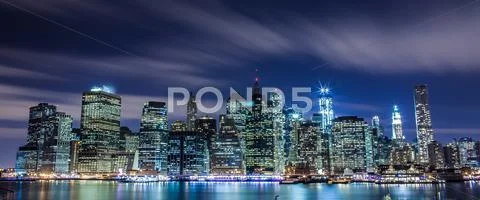Manhattan Skyline at Night Stock Photos